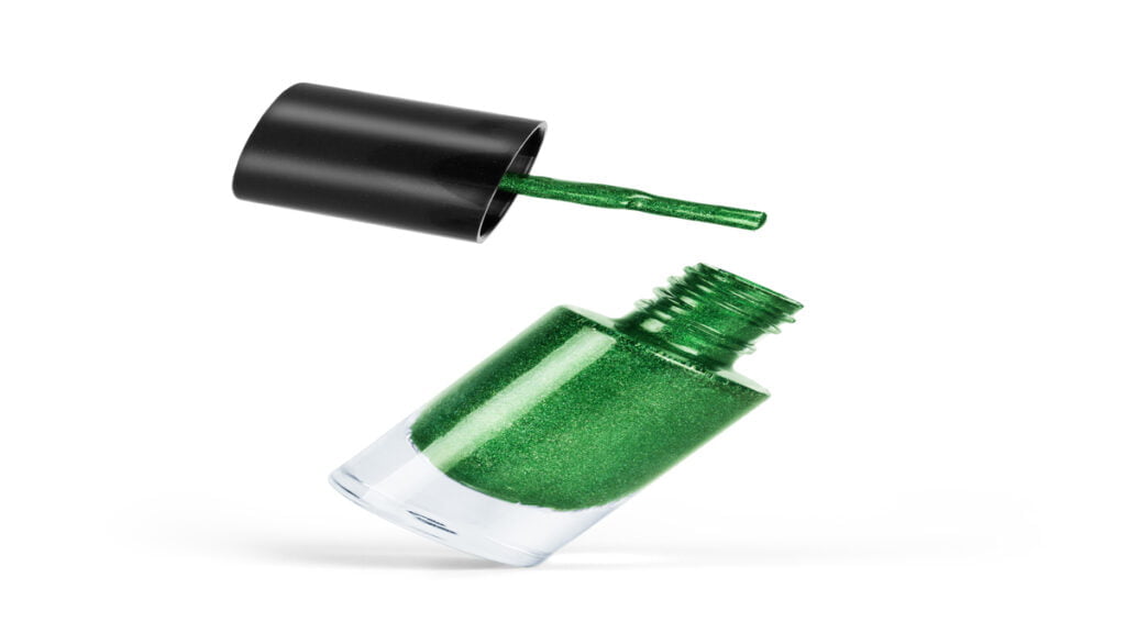 green nail polish on a white background